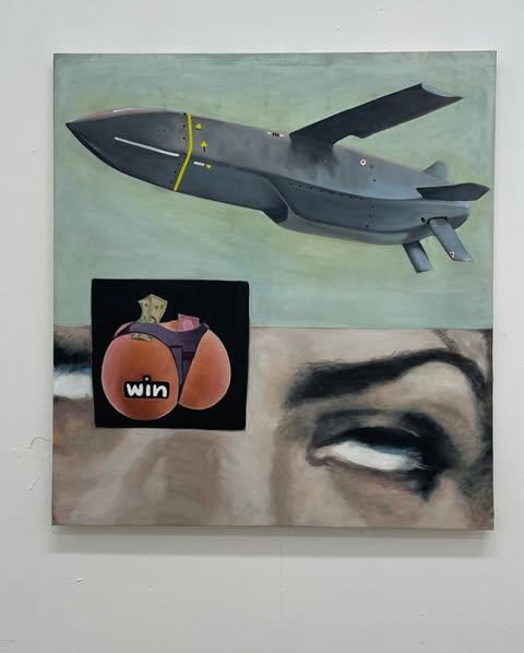 The unframed painting seen straight on, its raw canvas edges casting a soft shadow — the missile, the meme, and the eye held together in a quiet, unsettling equilibrium