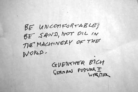 Bold angular handwriting on white paper: Be uncomfortable; be sand, not oil in the machinery of the world — Günther Eich’s postwar demand, transcribed with urgency